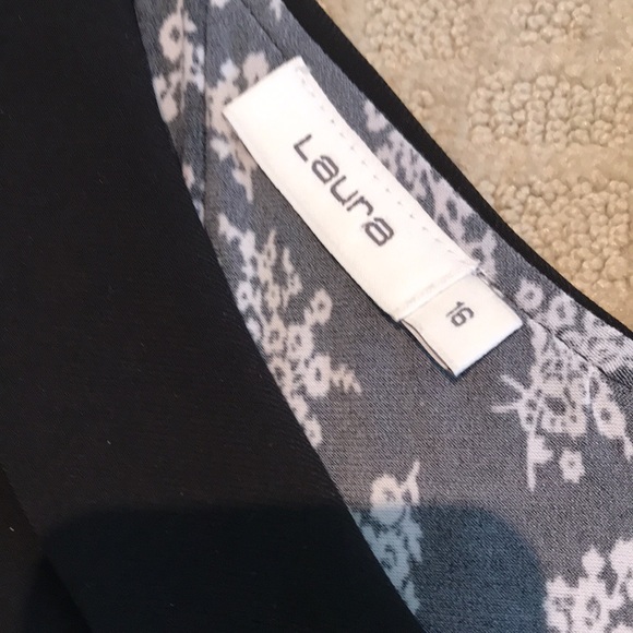 Flattering black and white flowy dress with double flap v neck collar. - Picture 11 of 15